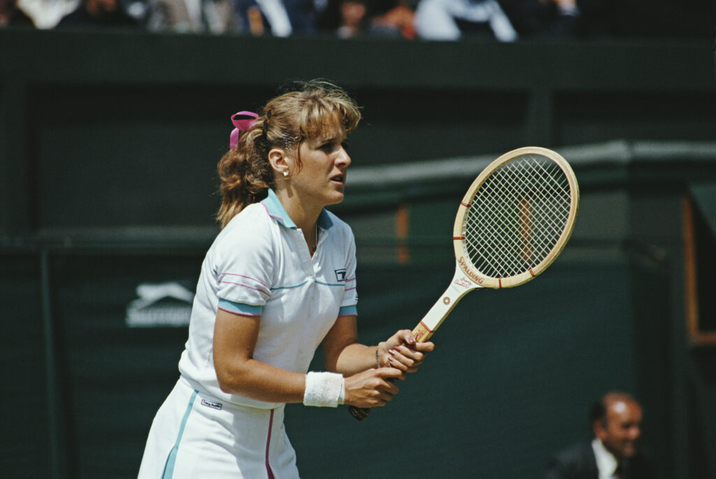 American tennis player Tracy Austin, plays in a singles match during the 1982 Wimbledon Tennis Championships at the club in Wimbledon, UK, June-July 1982.
