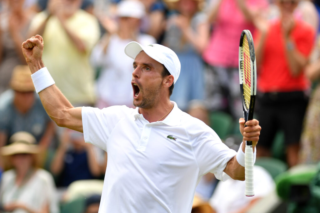 Roberto Bautista Agut celebrates at Wimbledon in 2019