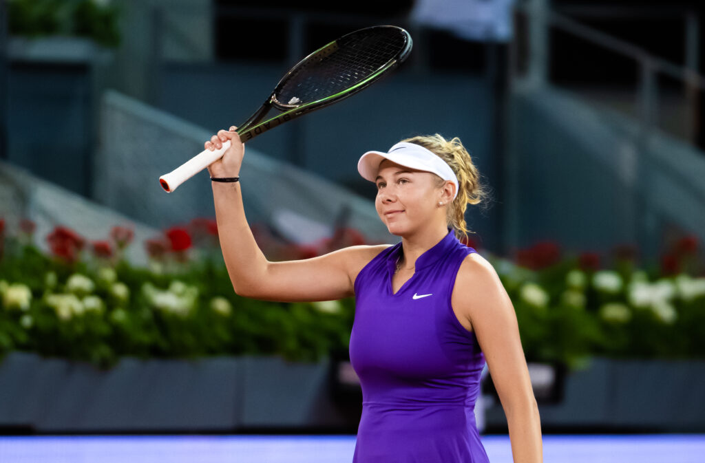 Amanda Anisimova of the United States in action against Aryna Sabalenka of Belarus during her first round match on Day 1 of the Mutua Madrid Open at La Caja Magica on April 28, 2022 in Madrid, Spain