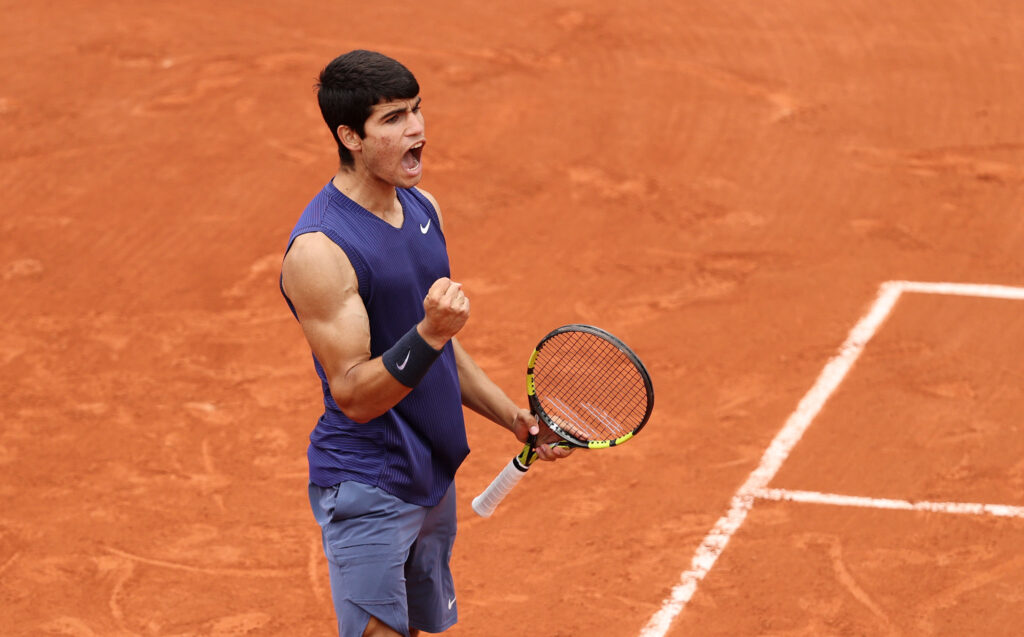 Carlos Alcaraz of Spain celebrates during his Men's Singles third round match against Jan-Lennard Struff of Germany on day seven of the 2021 French Open at Roland Garros on June 05, 2021 in Paris, France.