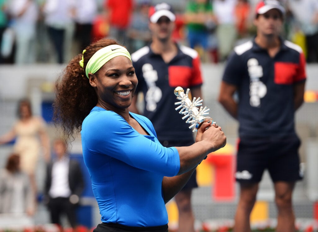 Serena Williams of the USA poses with the winners trophy after winning the final match of the Mutua Madrilena Madrid Open tennis tournament against Victoria Azarenka of Belarus at the Caja Magica on May 13, 2012 in Madrid, Spain.