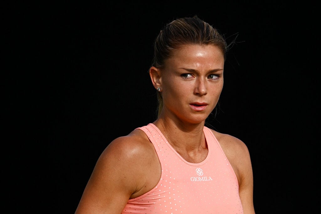 Camila Giorgi of Italy looks on against Ons Jabeur of Tunisia during the Women's Singles Second Round match on Day Five of the Rothesay International Eastbourne at Devonshire Park on June 28, 2023 in Eastbourne, England.