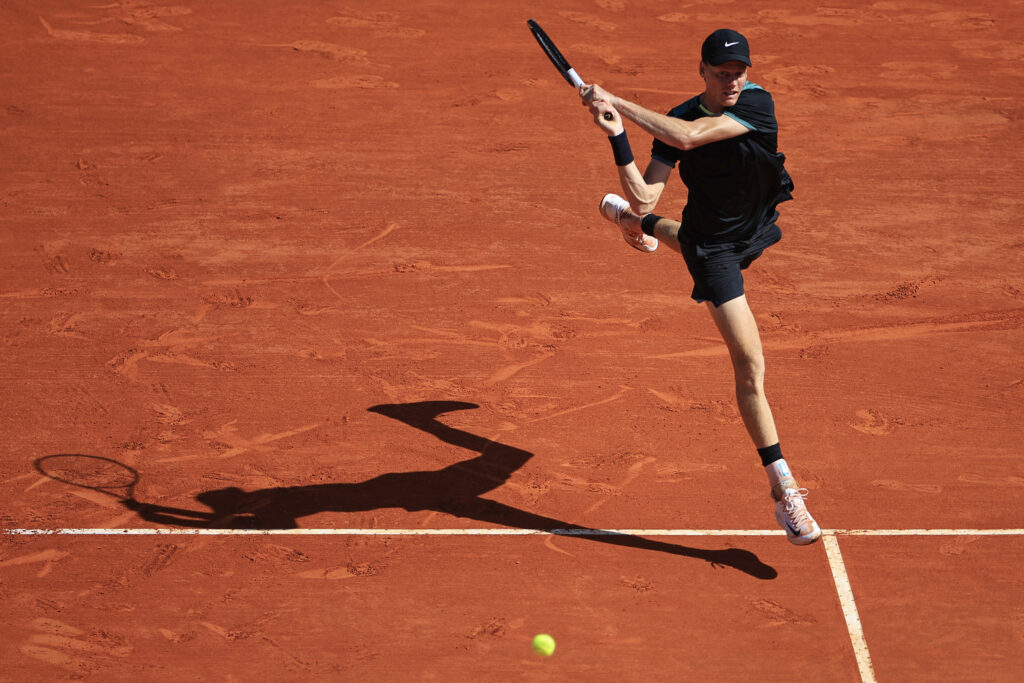 Italy's Jannik Sinner plays a backhand return to Greece's Stefanos Tsitsipas during their Monte Carlo ATP Masters Series Tournament semi final tennis match on the Rainier III court at the Monte Carlo Country Club on April 13, 2024.