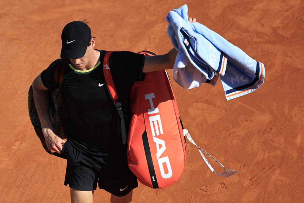 Italy's Jannik Sinner waves his towel as he leaves the court after his Monte Carlo ATP Masters Series Tournament semi final tennis match against Greece's Stefanos Tsitsipas on the Rainier III court at the Monte Carlo Country Club on April 13, 2024.