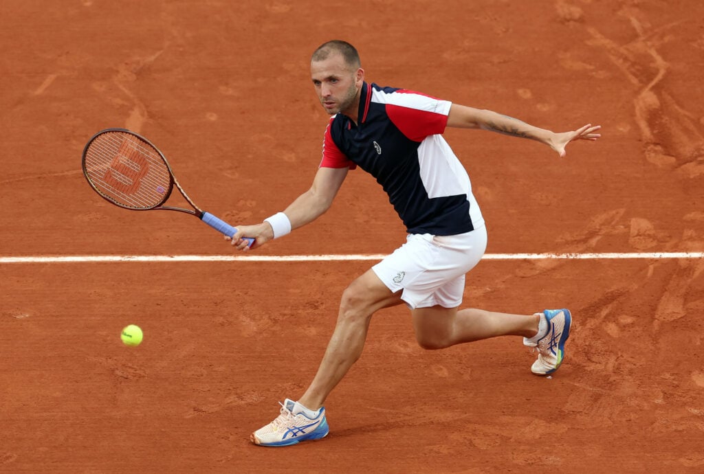 Daniel Evans of Great Britain is seen in action in his first round match against Holger Rune of Denmark during day three of the French Open at Roland Garros on May 28, 2024 in Paris, France.
