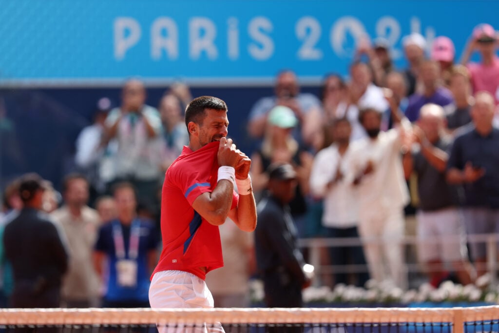 Novak Djokovic of Team Serbia celebrates match point during the Men's Singles Gold medal match against Carlos Alcaraz of Team Spain on day nine of the Olympic Games Paris 2024 at Roland Garros on August 04, 2024 in Paris, France.