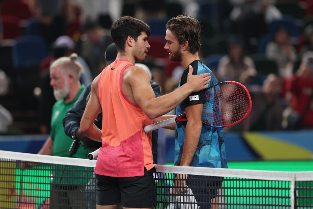 Carlos Alcaraz and Tomas Machac embrace at the 2024 Shanghai Masters
