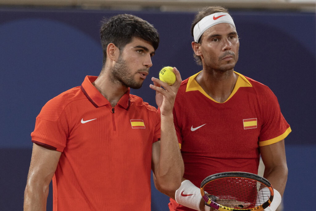 Carlos Alcaraz and Rafael Nadal playing together at the 2024 Olympics