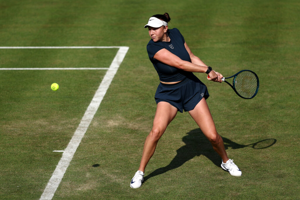 Amanda Anisimova of United States plays a backhand against Sonay Kartal of Great Britain during the Women's Singles Second Round match on Day Three of the 2025 HSBC Championships at The Queen's Club on June 11, 2025 in London, England.