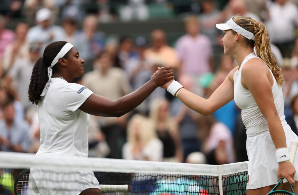 Hailey Baptiste of United States shakes hands with Mirra Andreeva at the net following defeat during the Ladies' Singles third round match on day six of The Championships Wimbledon 2025 at All England Lawn Tennis and Croquet Club on July 05, 2025 in London, England.