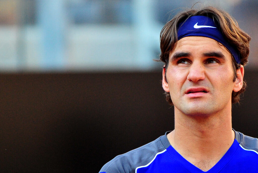 Switzerland's Roger Federer reacts during his ATP Rome Open tennis match against France's Richard Gasquet at the Foro Italico in Rome on May 12, 2011.