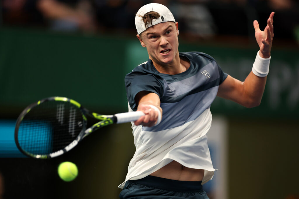 Holger Rune of Denmark plays a forehand against Ugo Humbert of France during the Men's Singles semi-final match on day eight of the BNP Paribas Nordic Open 2025 at Royal Tennis Hall on October 18, 2025 in Stockholm, Sweden.