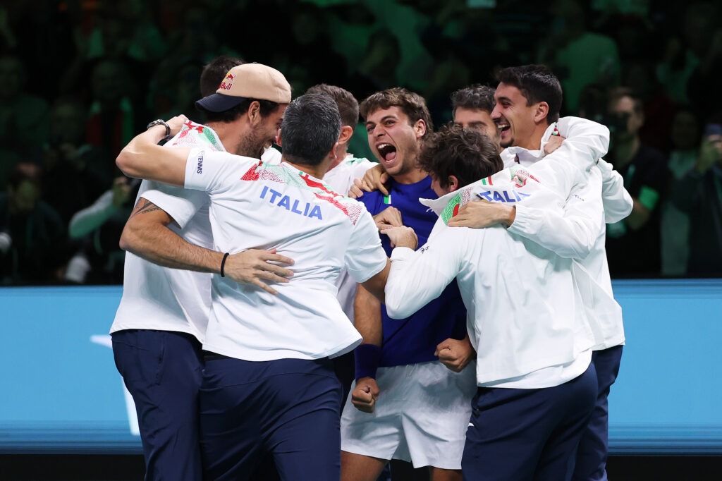 Flavio Cobolli of Italy celebrates with teammates after victory over Jaume Munar of Spain in the Davis Cup Final match between Italy and Spain at BolognaFiere Exhibition Centre on November 23, 2025 in Bologna, Italy.