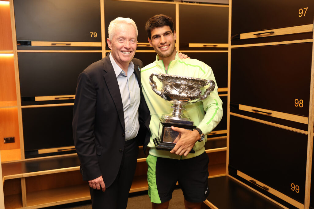 Craig Tiley, Chief Executive Officer of Tennis Australia poses with Carlos Alcaraz of Spain in the locker room after winning the Men's Singles Final against Novak Djokovic of Serbia during day 15 of the 2026 Australian Open at Melbourne Park on February 01, 2026 in Melbourne, Australia.