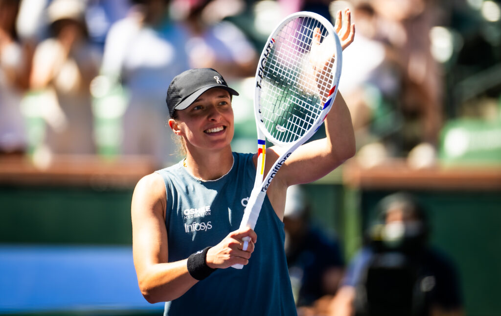 Iga Swiatek of Poland reacts to defeating Karolina Muchova of the Czech Republic in the fourth round on Day 8 of the BNP Paribas Open at Indian Wells Tennis Garden on March 11, 2026 in Indian Wells, California