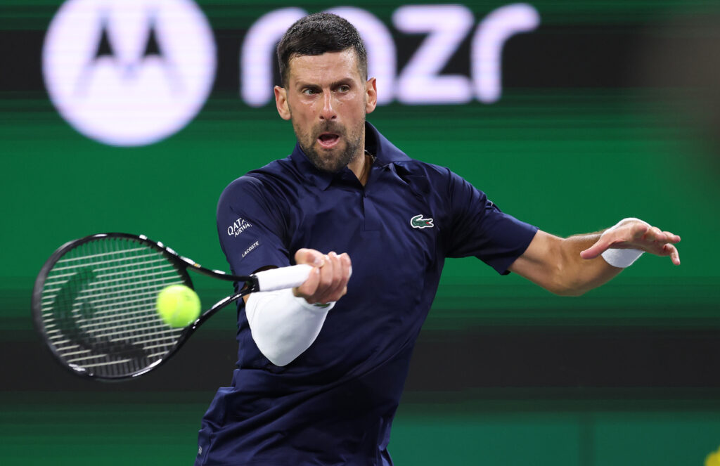 Novak Djokovic of Serbia plays a forehand against Jack Draper of Great Britain in their fourth round match of the BNP Paribas Open at Indian Wells Tennis Garden on March 11, 2026 in Indian Wells, California.
