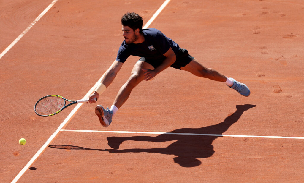 Carlos Alcaraz of Spain plays a forehand volley during his last practice session in Murcia, Spain as he prepares for the clay court season and defend his Monte-Carlo Masters title at Tennis Club Murcia on April 02, 2026 in Murcia, Spain.