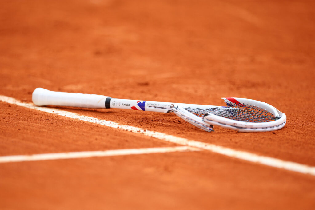 This photograph shows Russia's Daniil Medvedev's smashed racket on the clay as he plays against Italy's Matteo Berrettini during the Monte Carlo ATP Masters Series Tournament round of 32 tennis match on Court Rainier III at the Monte-Carlo Country Club in Roquebrune-Cap-Martin, south-eastern France on April 8, 2026.