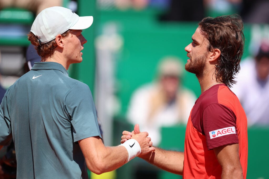 Jannik Sinner and Tomas Machac shake hands after their match at the 2026 Monte Carlo Masters