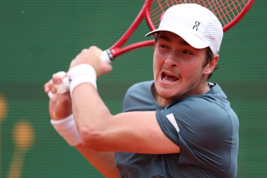 Joao Fonseca of Brazil plays a backhand during his quarter final match against Alexander Zverev of Germany on day Six of the Rolex Monte-Carlo Masters at Monte-Carlo Country Club on April 10, 2025 in Monte-Carlo, Monaco.