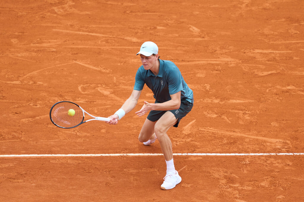 Jannik Sinner of Italy returns a ball during his Round of 32 match against Ugo Humbert of France on day three of the Rolex Monte-Carlo Masters at Monte-Carlo Country Club on April 07, 2026 in Monte-Carlo, Monaco.