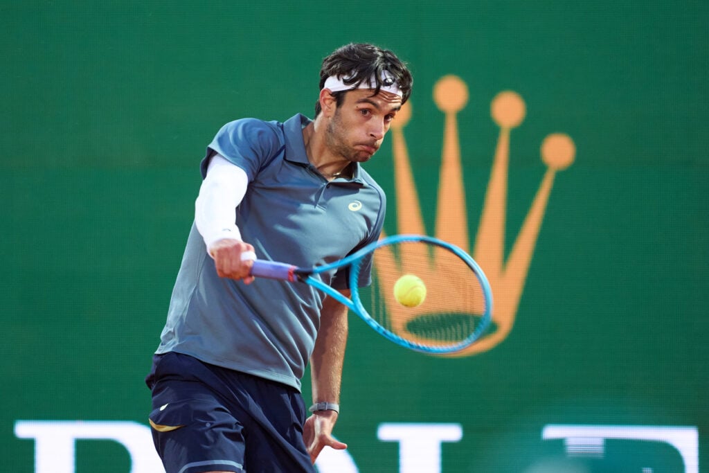 Lorenzo Musetti of Italy returns a ball during his Round of 32 match against Valentin Vacherot of Monaco on day four of the Rolex Monte-Carlo Masters at Monte-Carlo Country Club on April 08, 2026 in Monte-Carlo, Monaco.
