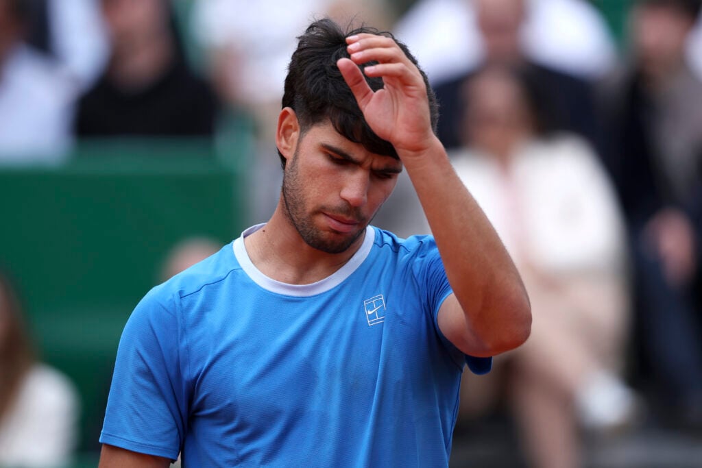 Carlos Alcaraz of Spain looks dejected during his Final match against Jannik Sinner of Italy on day Eight of the Rolex Monte-Carlo Masters at Monte-Carlo Country Club on April 12, 2026 in Monte-Carlo, Monaco.