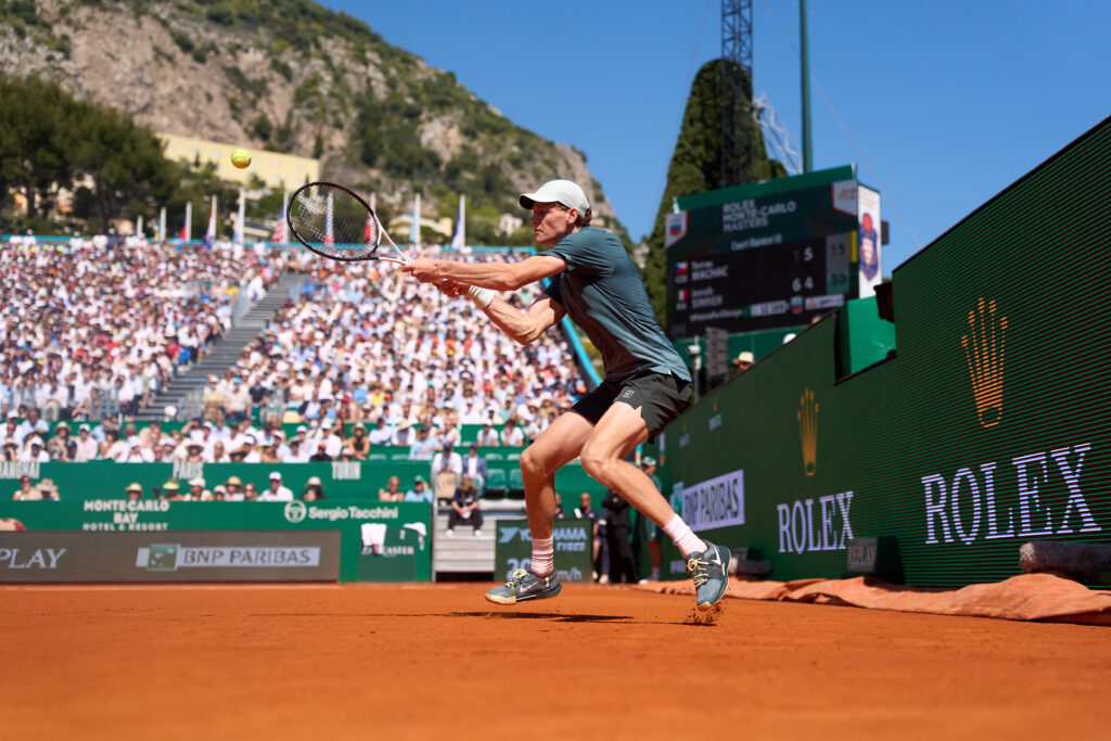 Jannik Sinner of Italy returns the ball during his Round of 16 match against Tomas Machac of Czech Republic on day five of the Rolex Monte-Carlo Masters at Monte-Carlo Country Club on April 09, 2026 in Monte-Carlo, Monaco.