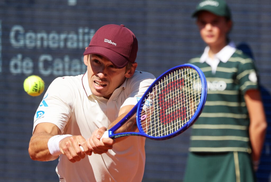 Alex de Minaur competes against Sebastian Ofner during the round of 32 match on Day Two of the Barcelona Open Banc Sabadell 73rd Conde de Godo Trophy at Real Club de Tenis Barcelona 1899 in Barcelona, Spain, on April 14, 2026.