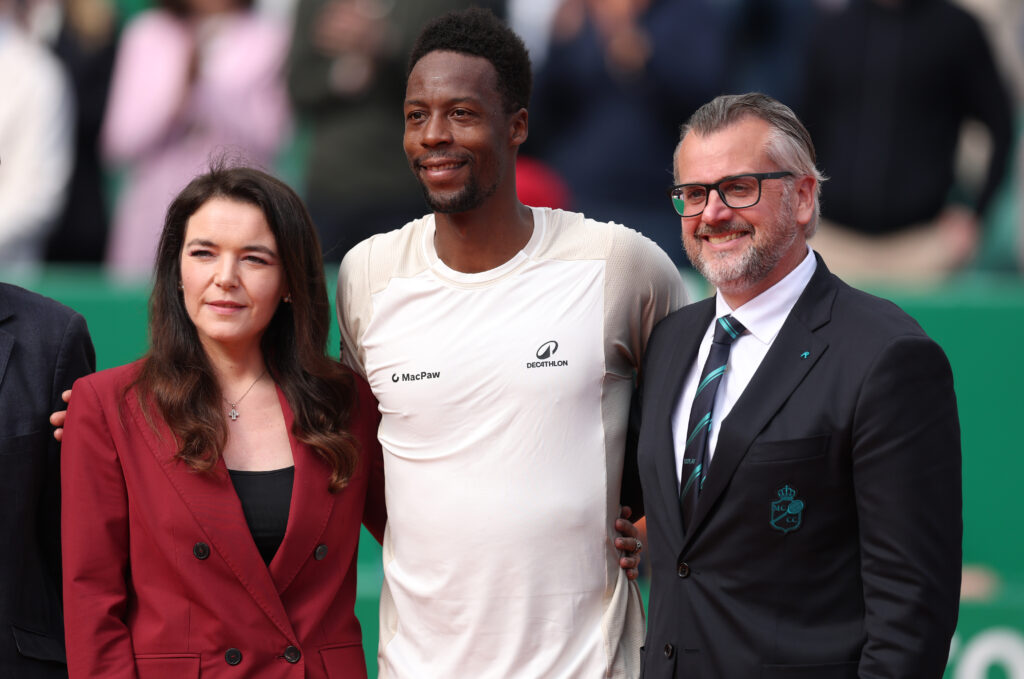Gael Monfils of France poses for a photo with tournament director David Massey and Melanie-Antoinette de Massy after his last match at this tournament after losing to Alexander Bublik of Kazakstan during day three of the Rolex Monte-Carlo Masters at Monte-Carlo Country Club on April 07, 2026 in Monte-Carlo, Monaco.