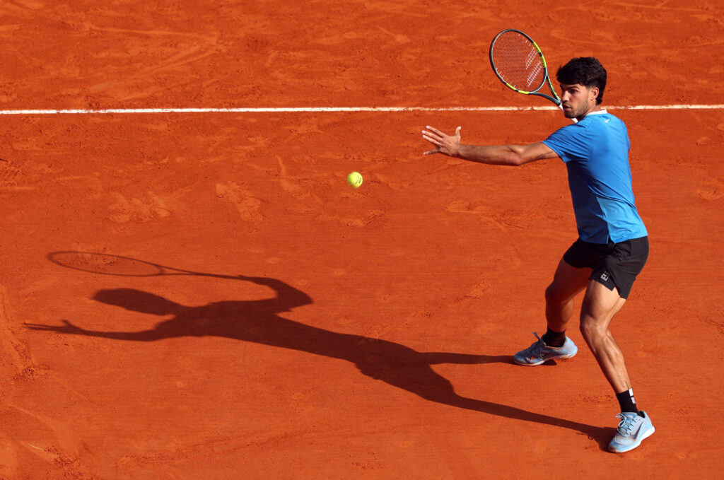 Carlos Alcaraz of Spain plays a forehand against Valentin Vacherot of Monaco during the Men's Singles Semi Final match on day seven of the Rolex Monte-Carlo Masters at Monte-Carlo Country Club on April 11, 2026 in Monte-Carlo, Monaco.