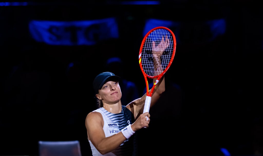Iga Swiatek of Poland celebrates after defeating Laura Siegemund of Germany in the second round on Day Three of the Porsche Tennis Grand Prix at Porsche Arena on April 15, 2026 in Stuttgart, Germany.