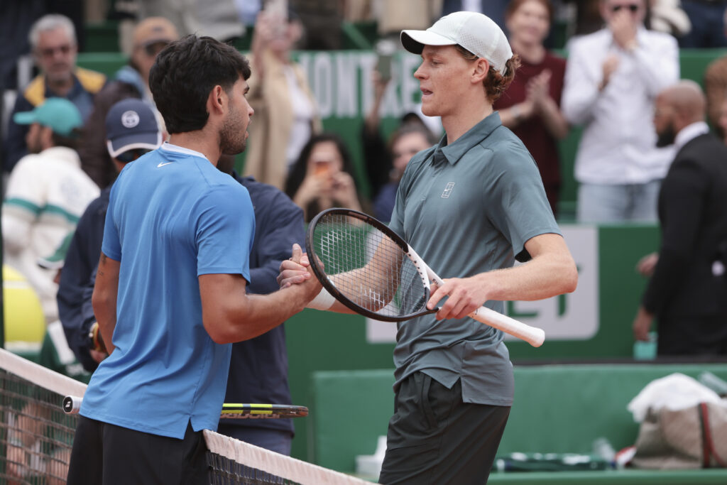 Winner Jannik Sinner of Italy (right) hugs Carlos Alcaraz of Spain after the Men's Final on day 8 of the Rolex Monte-Carlo Masters 2026, an ATP Masters 1000 at Monte-Carlo Country Club on April 12, 2026 in Roquebrune-Cap-Martin, France near Monte-Carlo, Monaco.