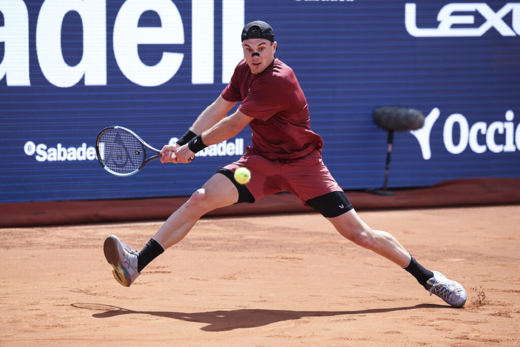 Jack Draper of Great Britain in action against Tomas Martin Etcheverry of Argentina during the First round tennis match of the Barcelona Open Banc Sabadell - Conde Godo 2026 Day 3 at Real Club de Tenis Barcelona on April 13, 2026 in Barcelona, Spain.