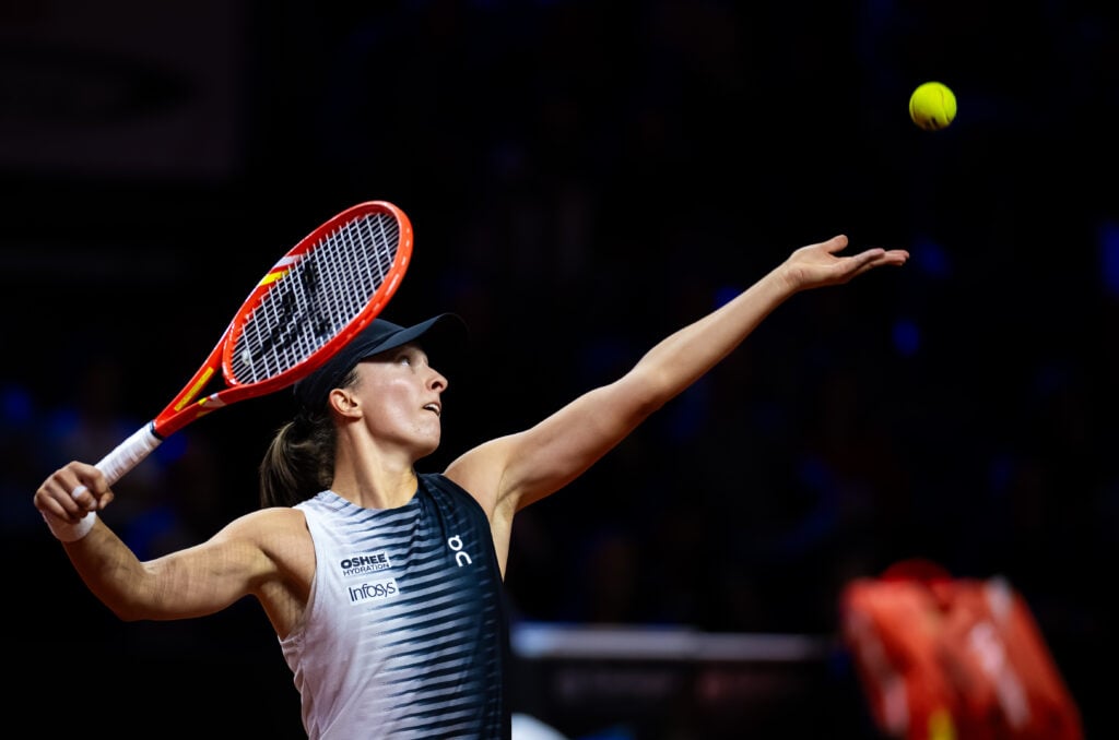Iga Swiatek serves in Stuttgart in 2026