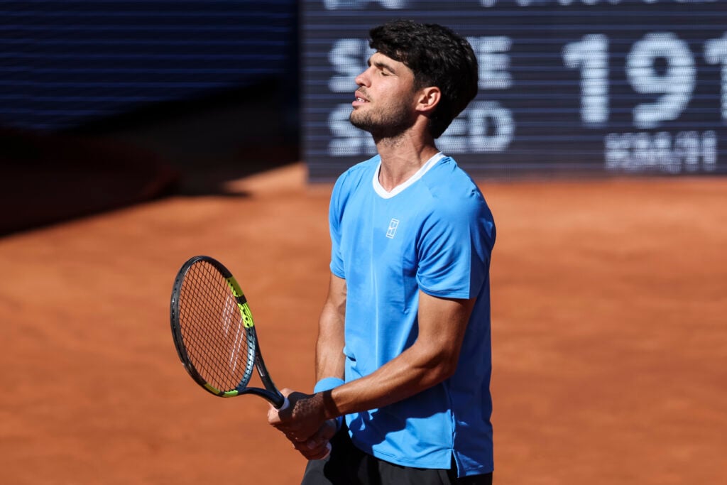 Carlos Alcaraz of Spain in action against Otto Virtanen of Finland during the First round tennis match of the Barcelona Open Banc Sabadell - Conde Godo 2026 Day 4 at Real Club de Tenis Barcelona on April 14, 2026 in Barcelona, Spain.