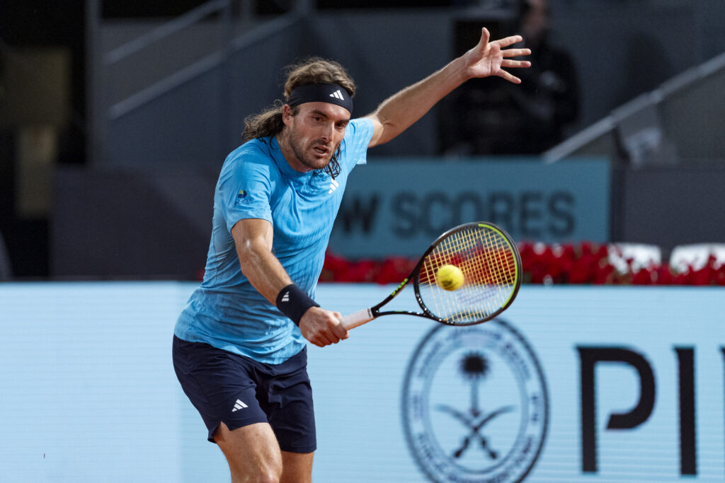 Stefanos Tsitsipas of Greece plays a backhand against Alexander Bublik during the round of 64 match during the Mutua Madrid Open 2026 tournament celebrated at La Caja Magica on April 25, 2026 in Madrid, Spain.