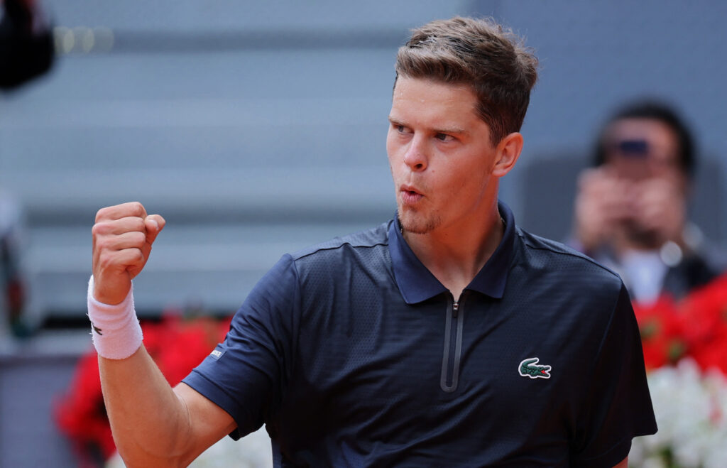 Alexander Blockx celebrates his win over Casper Ruud in Madrid