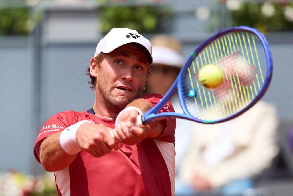 Casper Ruud of Norway plays a backhand against Alexander Blockx of Belgium during the 2026 Mutua Madrid Open Men's quarter-final match on Day Eleven at La Caja Magica on April 30, 2026 in Madrid, Spain.