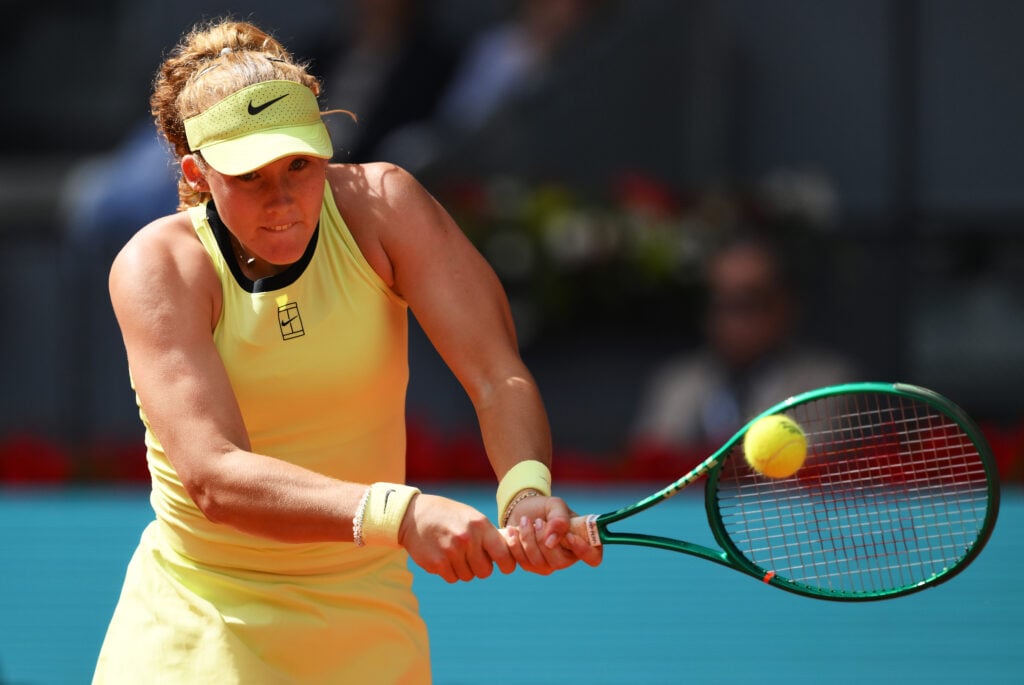Mirra Andreeva hits a backhand to Hailey Baptiste of the USA during their Madrid Open semi-final match at the at La Caja Magica on April 30, 2026 in Madrid, Spain.