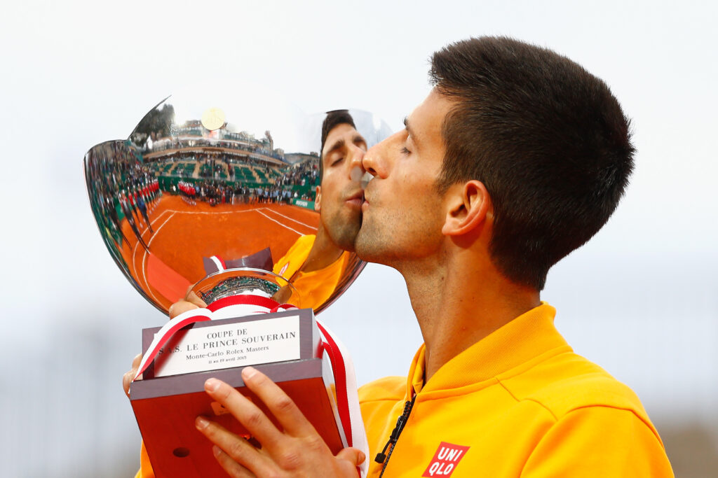Novak Djokovic of Serbia celebrates with the winners trophy after defeating Tomas Berdych of Czech Republic in the final during day eight of the Monte Carlo Rolex Masters tennis at the Monte-Carlo Sporting Club on April 19, 2015 in Monte-Carlo, Monaco.