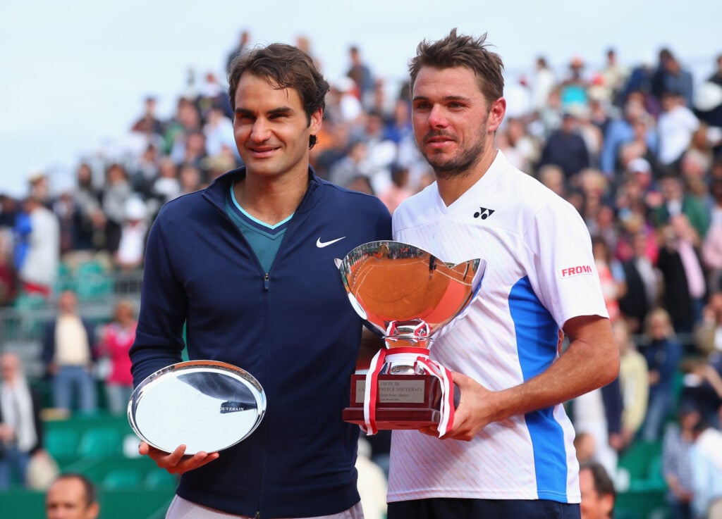 Stanislas Wawrinka of Switzerland with the winners trophy along side runner up Roger Federer of Switzerland in the final during day eight of the ATP Monte Carlo Rolex Masters Tennis at Monte-Carlo Sporting Club on April 20, 2014 in Monte-Carlo, Monaco.