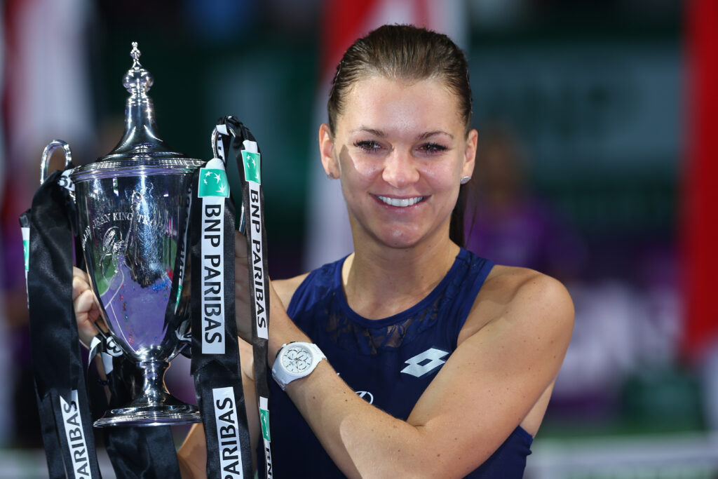 Agnieszka Radwanska celebrates after winning the WTA Finals