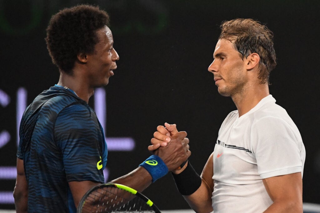 Rafael Nadal and Gael Monfils shake hands