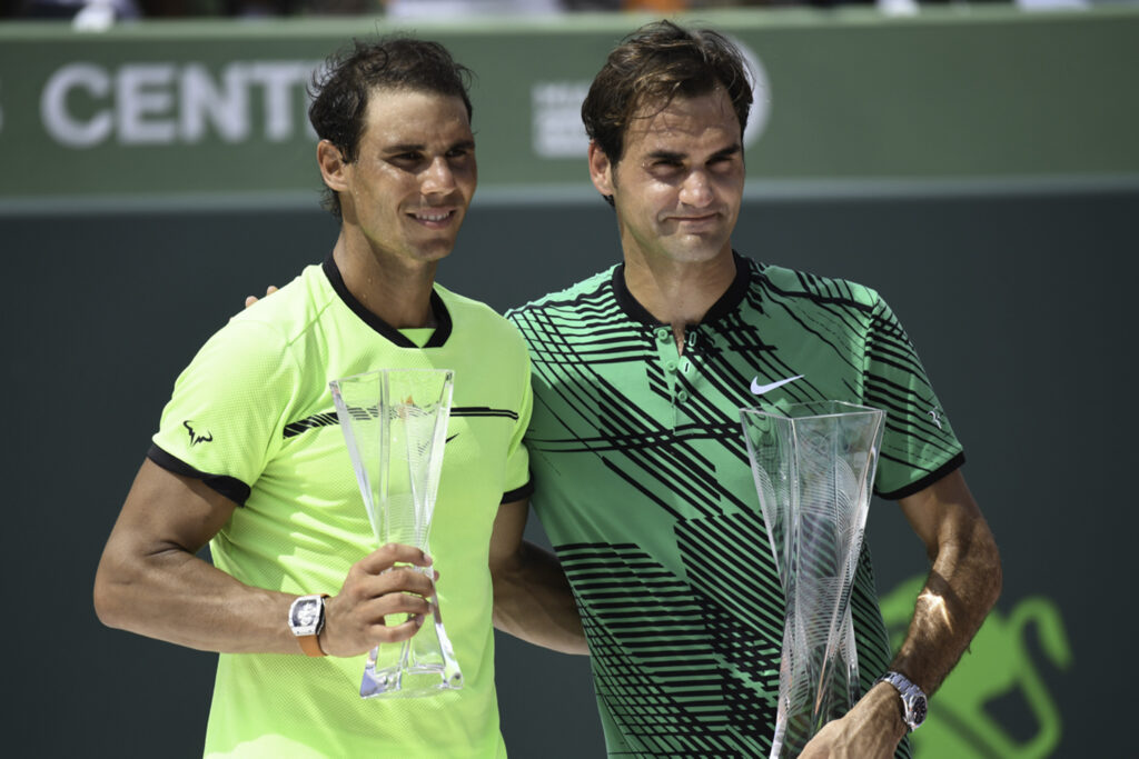 Roger Federer of Switzerland and runner-up Rafael Nadal of Spain hold their trophies after the Men's Final at Crandon Park Tennis Center on April 2, 2017 in Key Biscayne, Florida