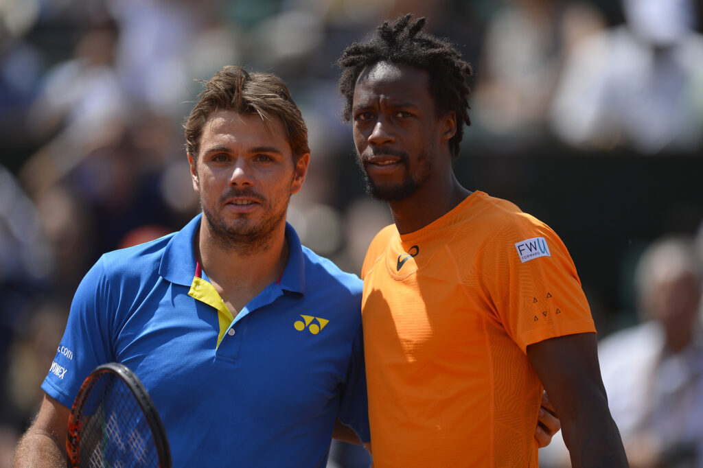 Gael Monfils of France and Stanislas Wawrinka of Switzerland pose before the men's singles fourth round match against on day nine of the 2017 French Open at Roland Garros on June 5, 2017 in Paris, France