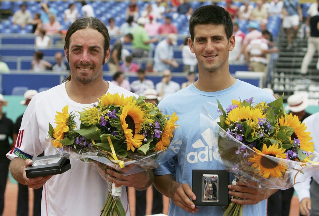 Novak Djokovic (R) of Serbia & Montenegro and Nicolas Massu of Chile pose for photographers after Djokovic beat Massu in straight sets in the final during the Dutch Open Tennis on July 23, 2006 in Amersfoort, Netherlands.