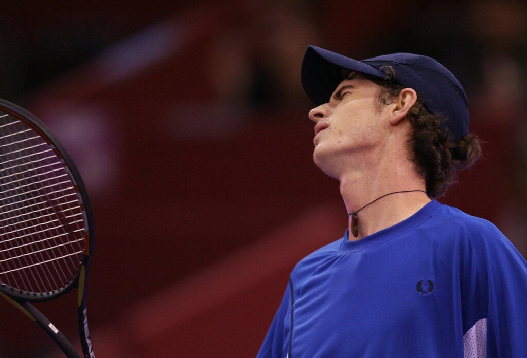 Briton Andy Murray reacts after losing a point against Serbian Novak Djokovic during their tennis masters match at Rockodromo Arena in Madrid, 19 October 2006.