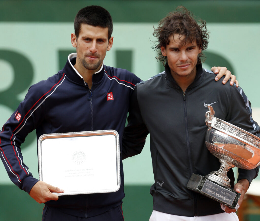 Rafael Nadal and Novak Djokovic pose with their trophies
