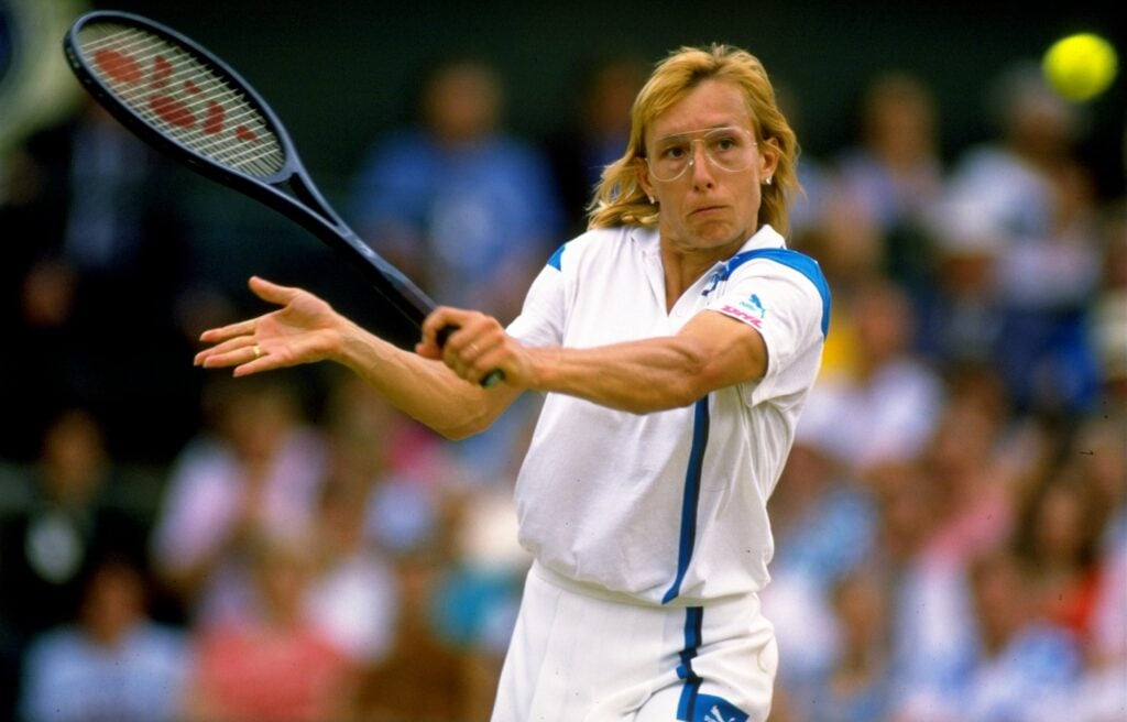 Martina Navratilova of the USA plays a backhand volley at Wimbledon.